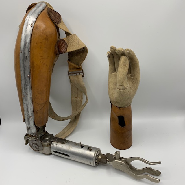 A rare mechanical prosthetic arm from Germany, marked Martin - Fleaglass