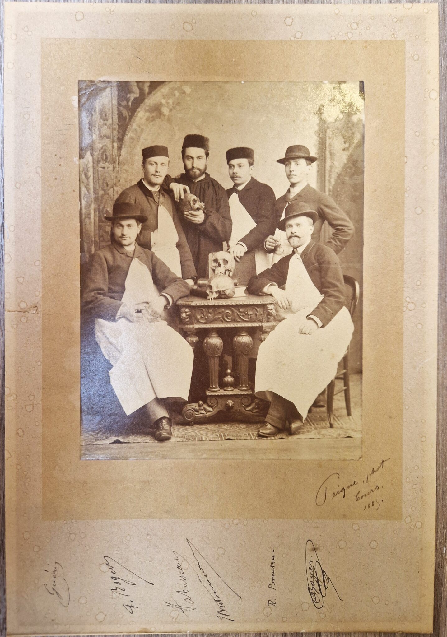 Rare original albumen printF of five surgical students or professors and their anatomy skulls in 1885