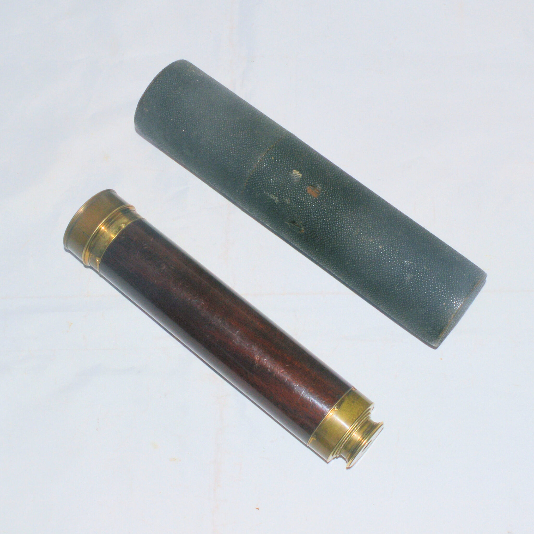 Three draw telescope c.1777, Samuel Whitford, sharkskin case.