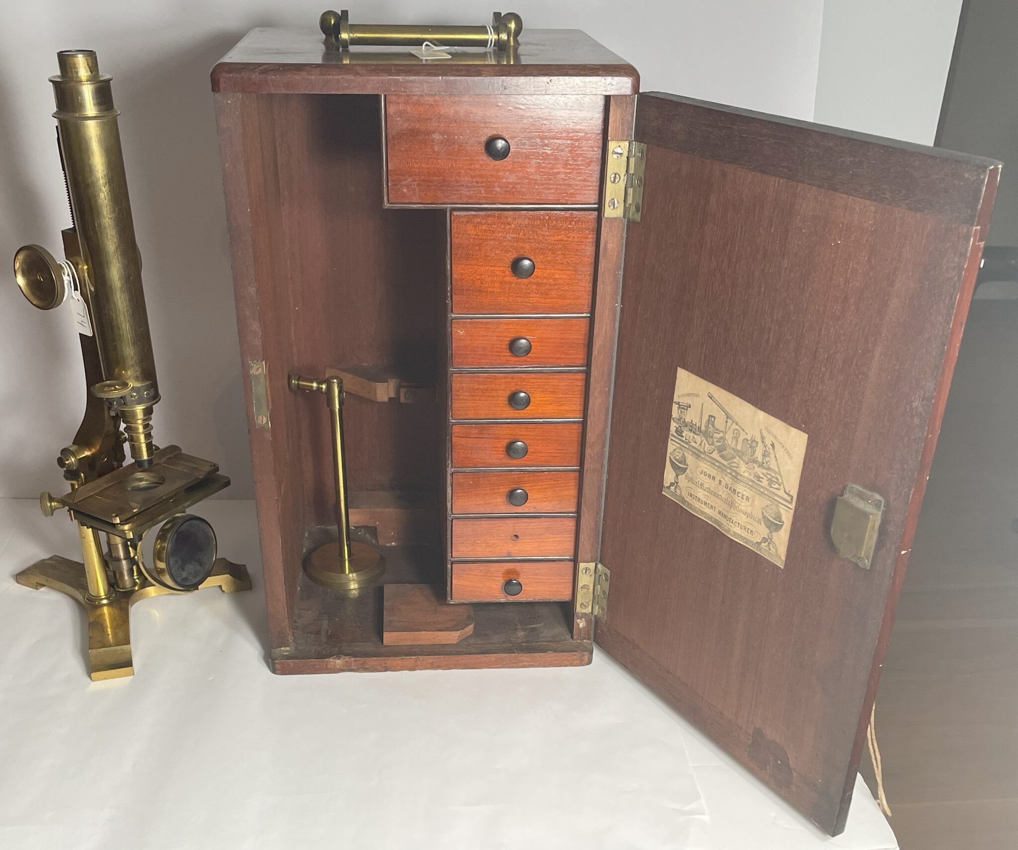 Large, signed J.B. Dancer Microscope with case and accessories.