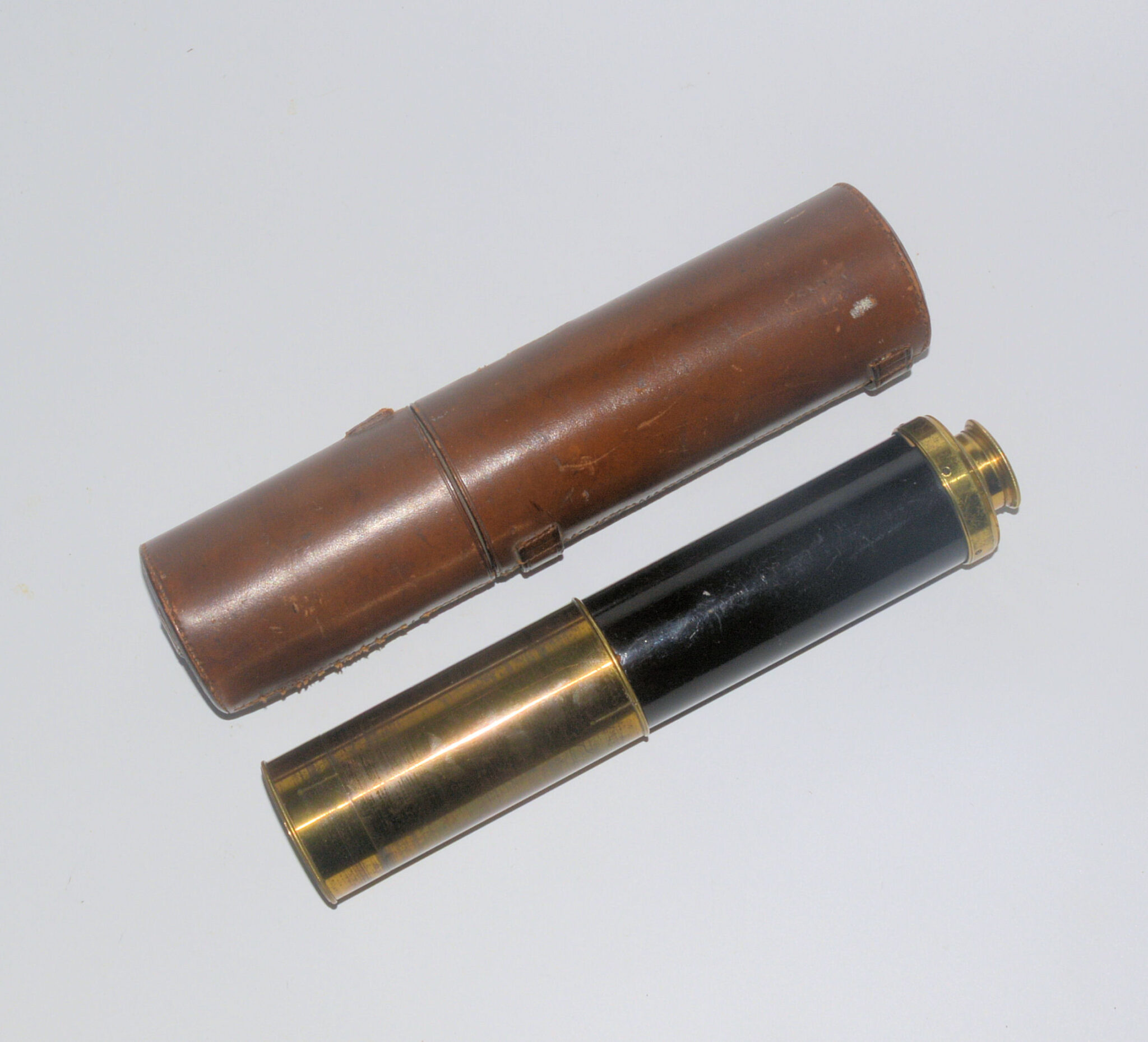 Three draw telescope and case by Dollond.